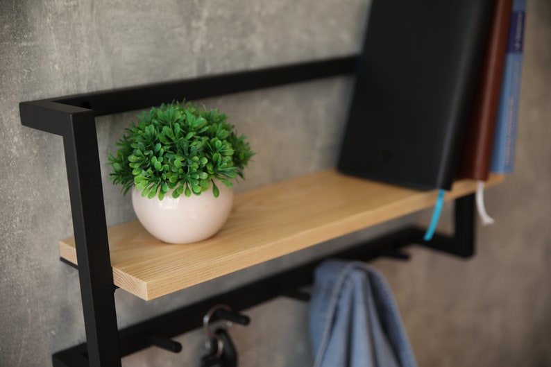 MAGHJI Wall-Mounted Wooden Shelf with Hooks, Black.